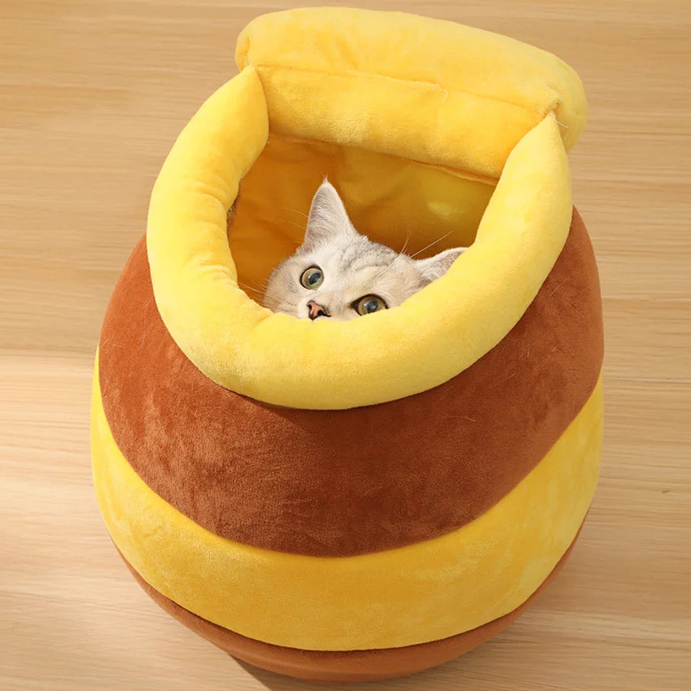 Bezauberndes Katzenbett mit Honigglas-Motiv