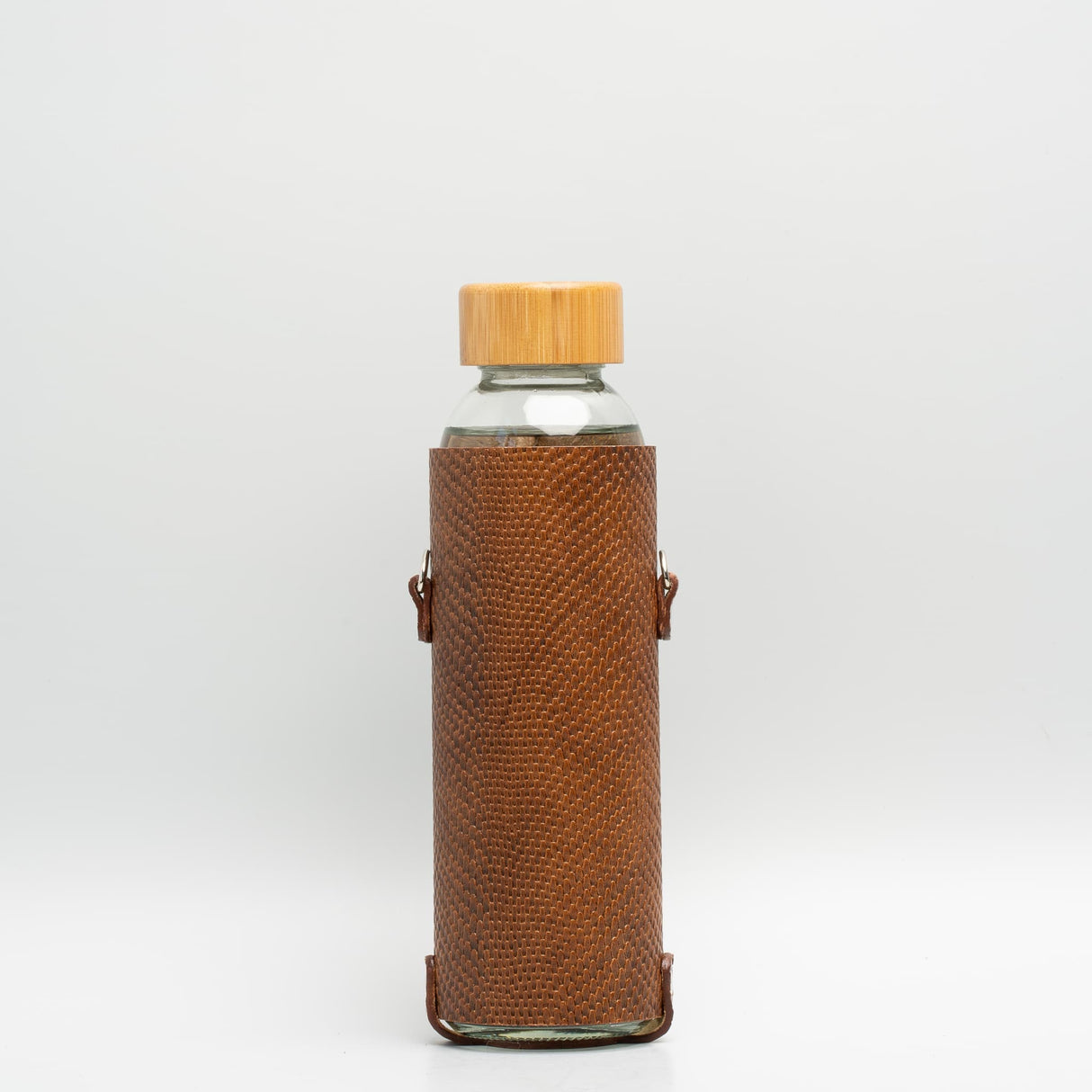 Porte-bouteille en cuir avec sangle et bouteille en verre